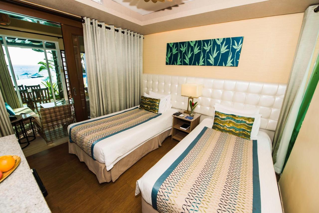 Acuatico Beach Resort & Hotel Inc. Сан-Хуан Экстерьер фото